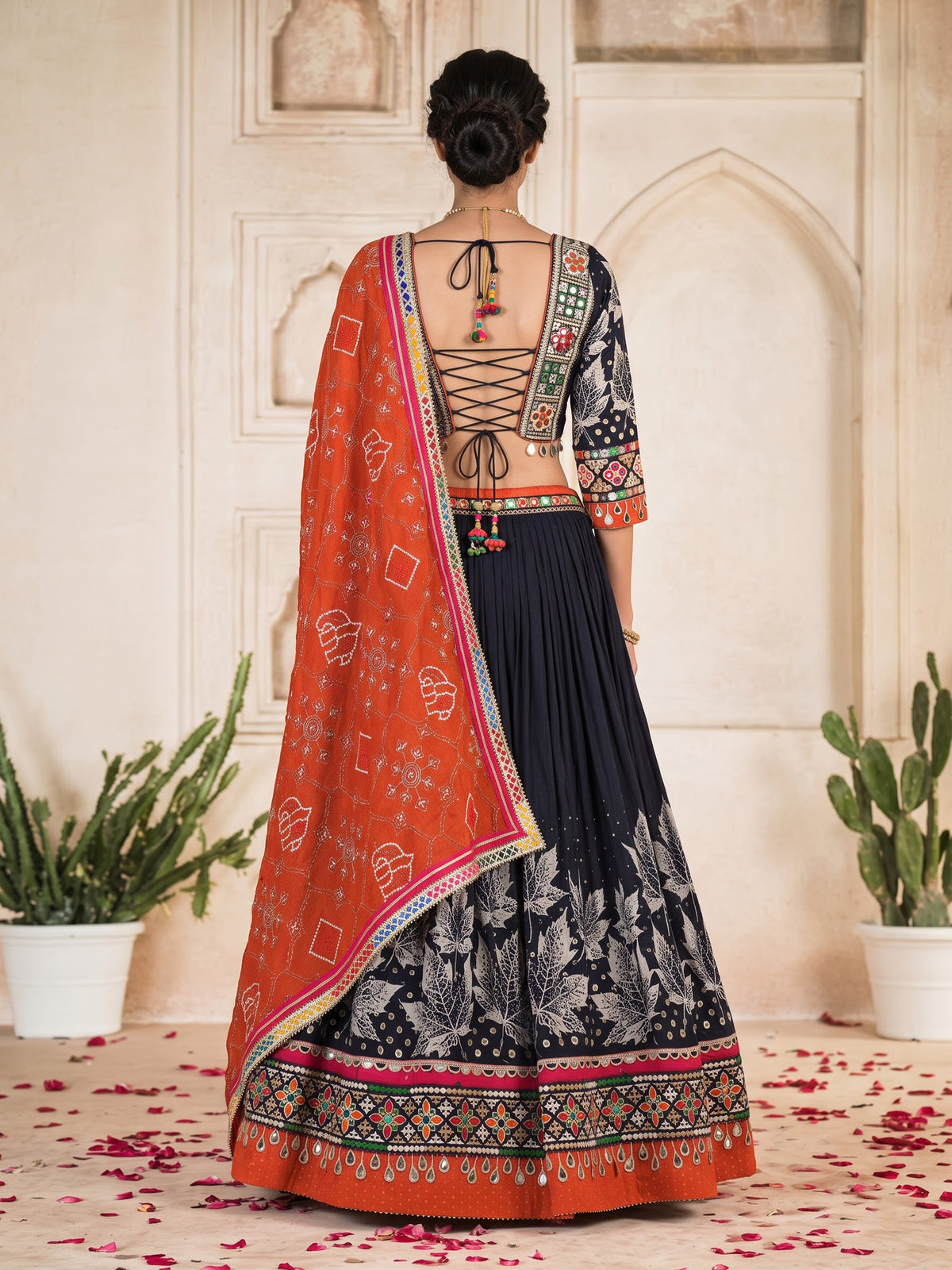 Black cotton silk chaniya choli with mirror and cowrie work