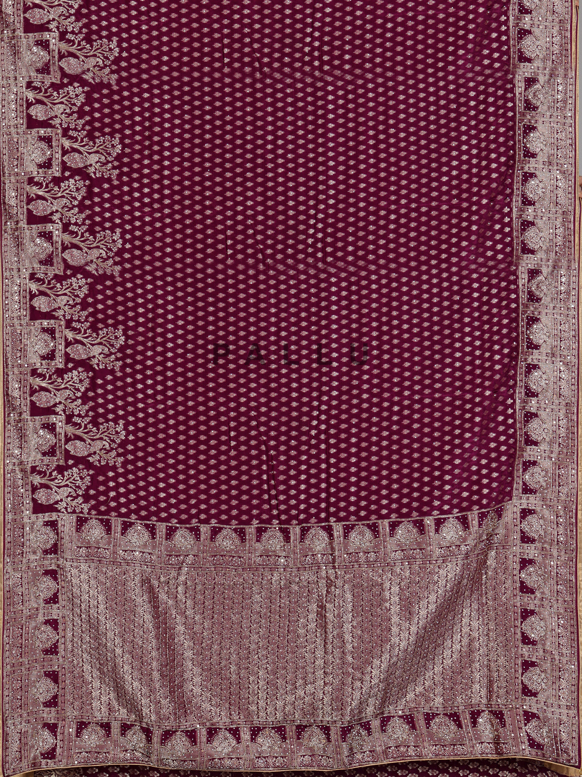 Dark purple embellished dola silk saree