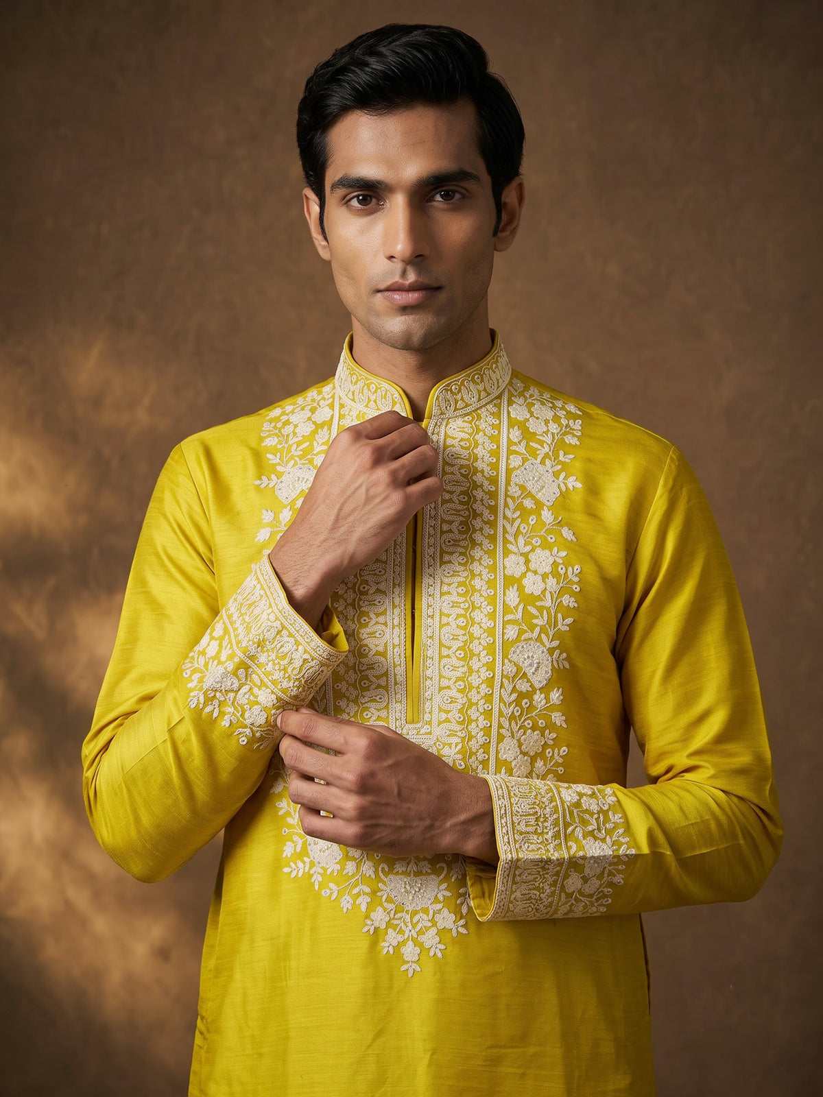 Mustard yellow silk kurta suit with ornate embellished yoke