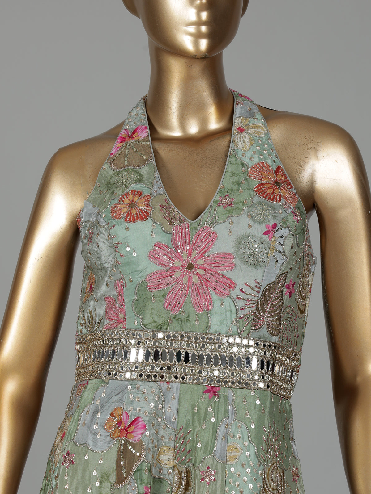 Pista green silk designer jumpsuit with floral resham embellishments