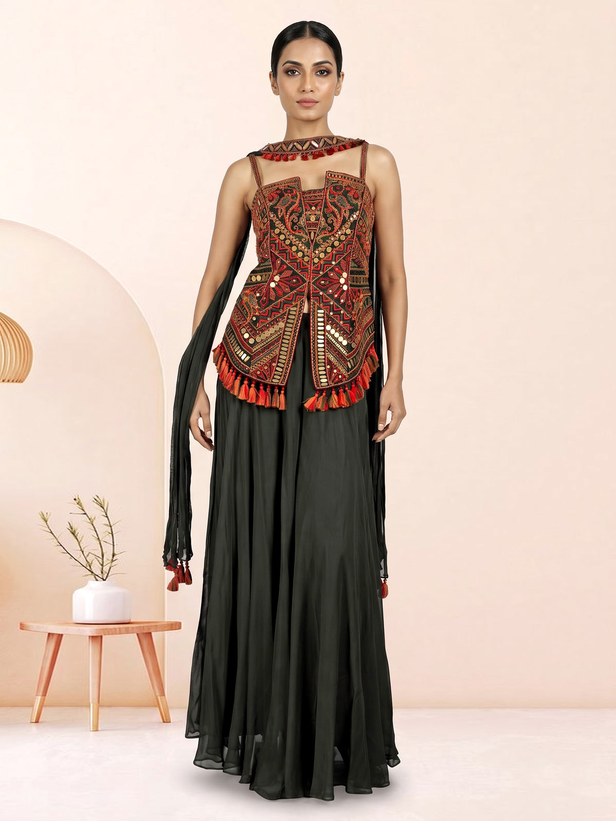 Mehendi green georgette palazzo suit with embroidered tassel detailing