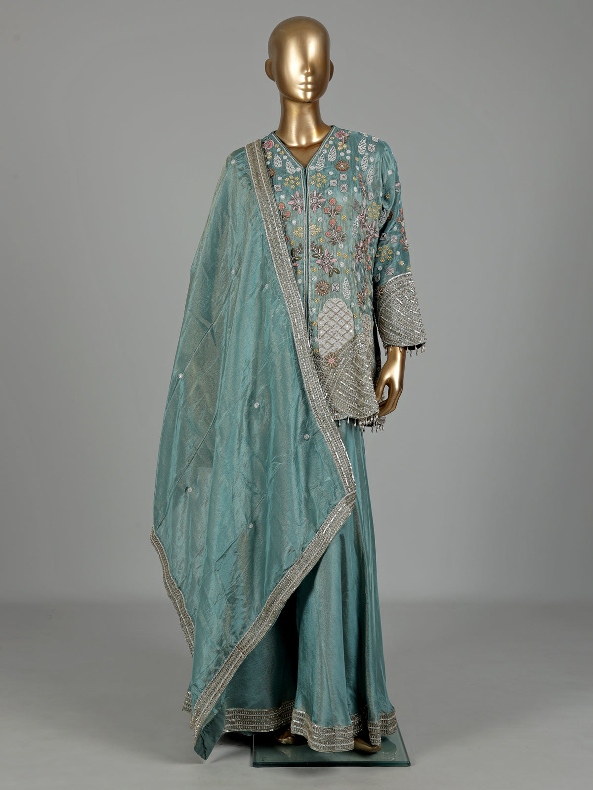Pastel mint blue silk palazzo suit with sequins and tassel detailing