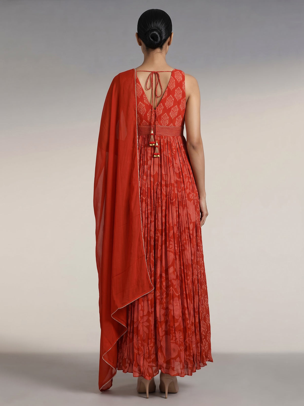 Rust red printed georgette silk anarkali with aabla embellishments