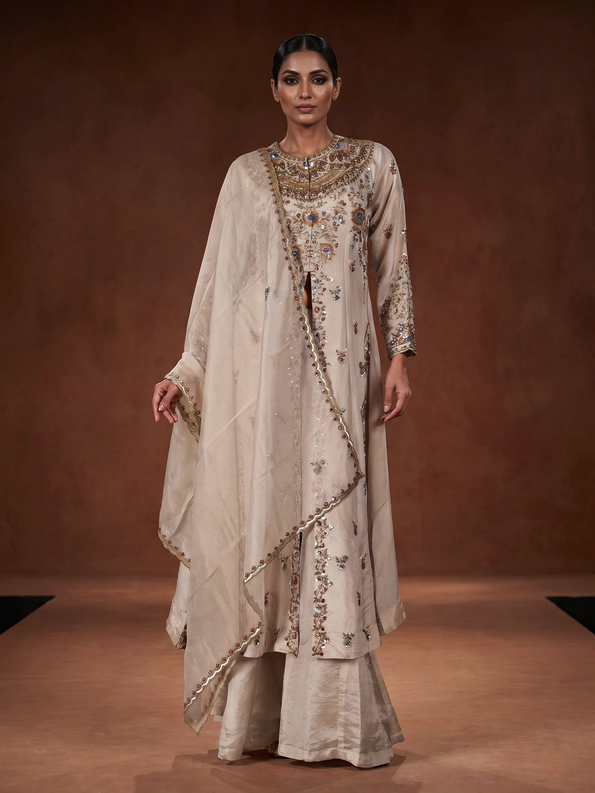 Off white tissue silk anarkali suit with pearl embellishments