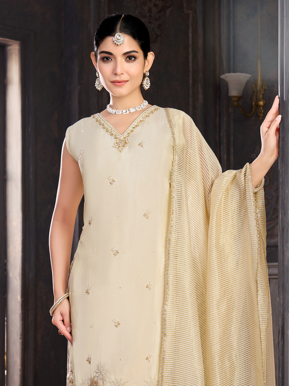 Cream silk salwar suit with V neck suit