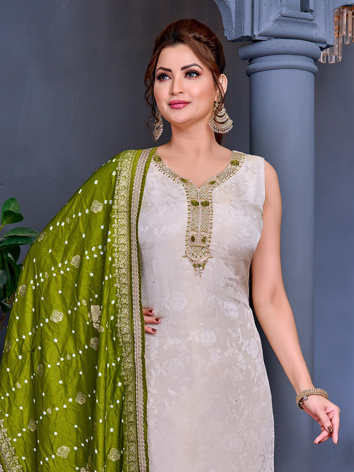 Beige shimmer salwar suit with mehendi dupatta and zardosi work