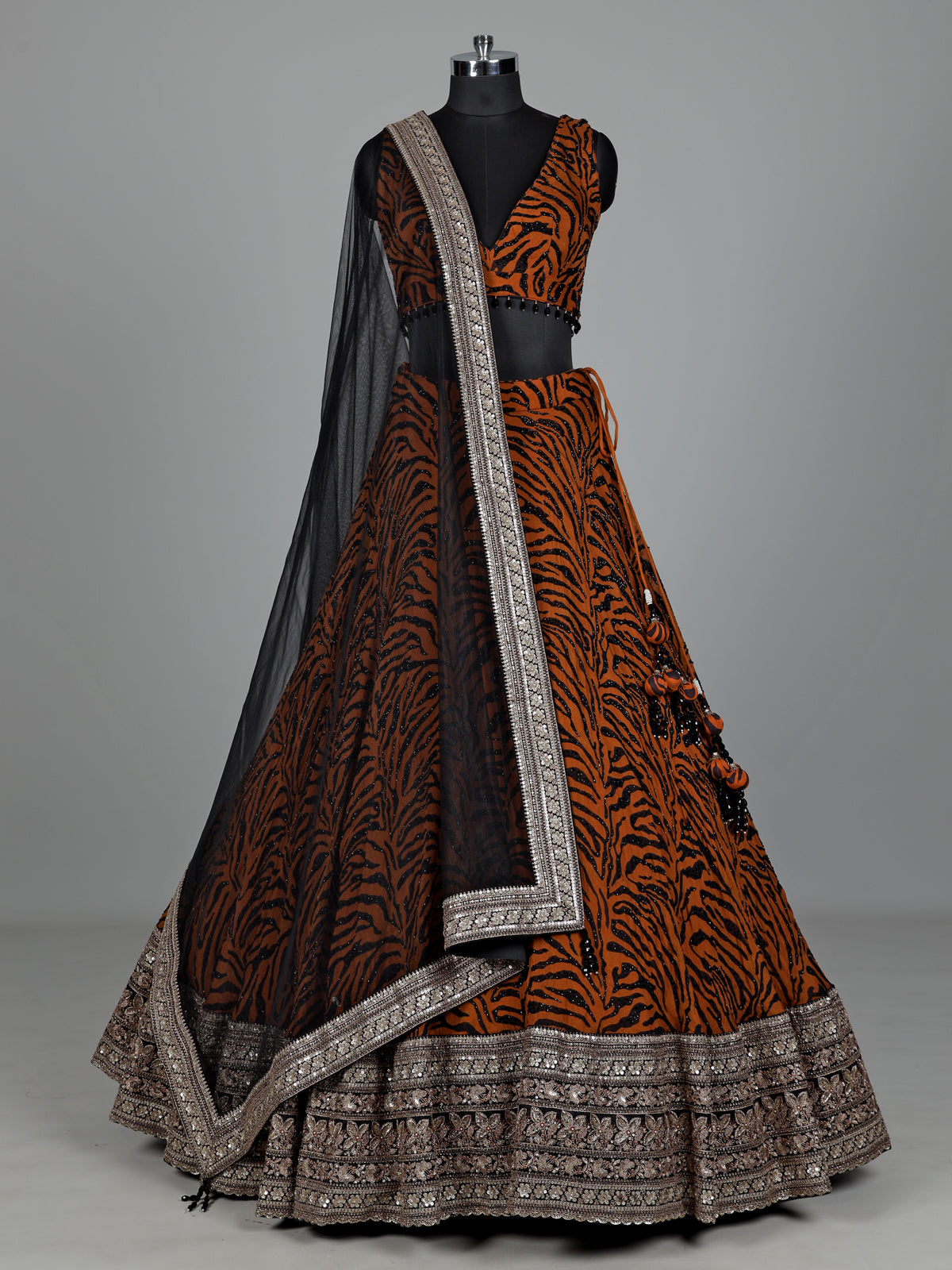 Orange silk lehenga choli with embroidered printed dupatta