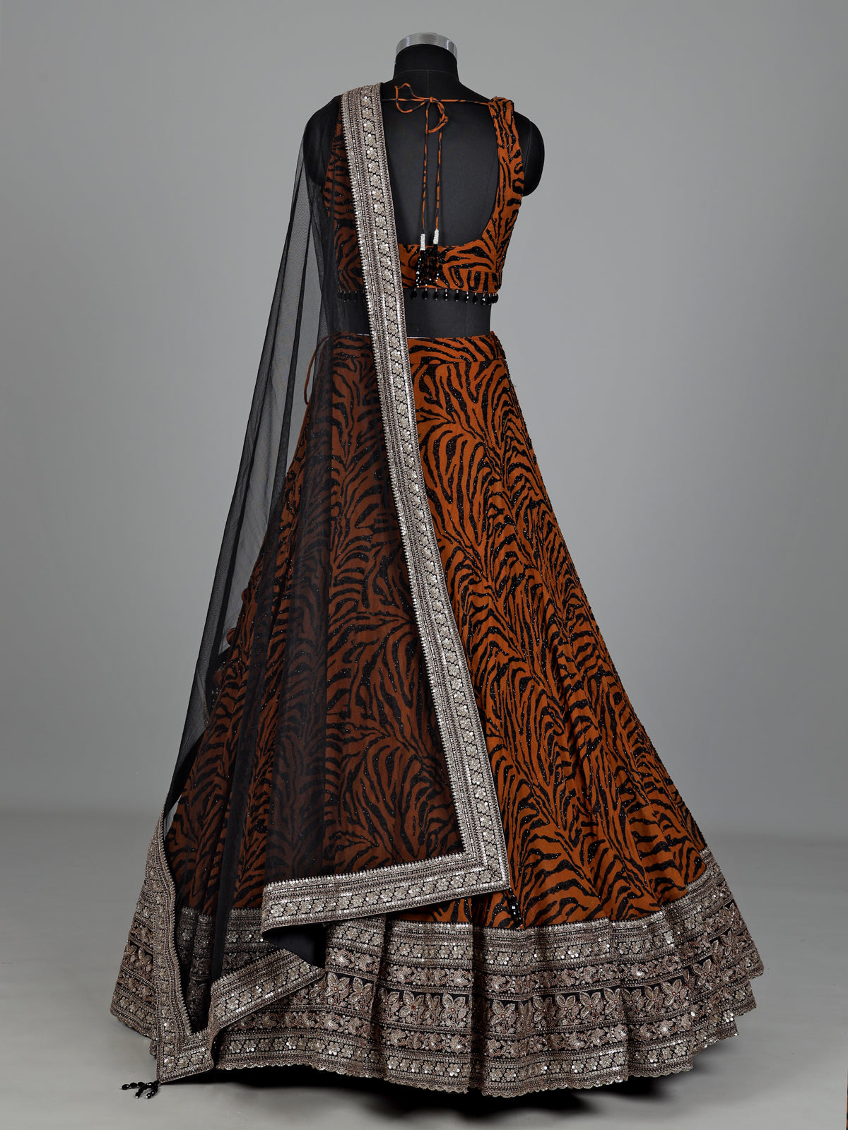 Orange silk lehenga choli with embroidered printed dupatta