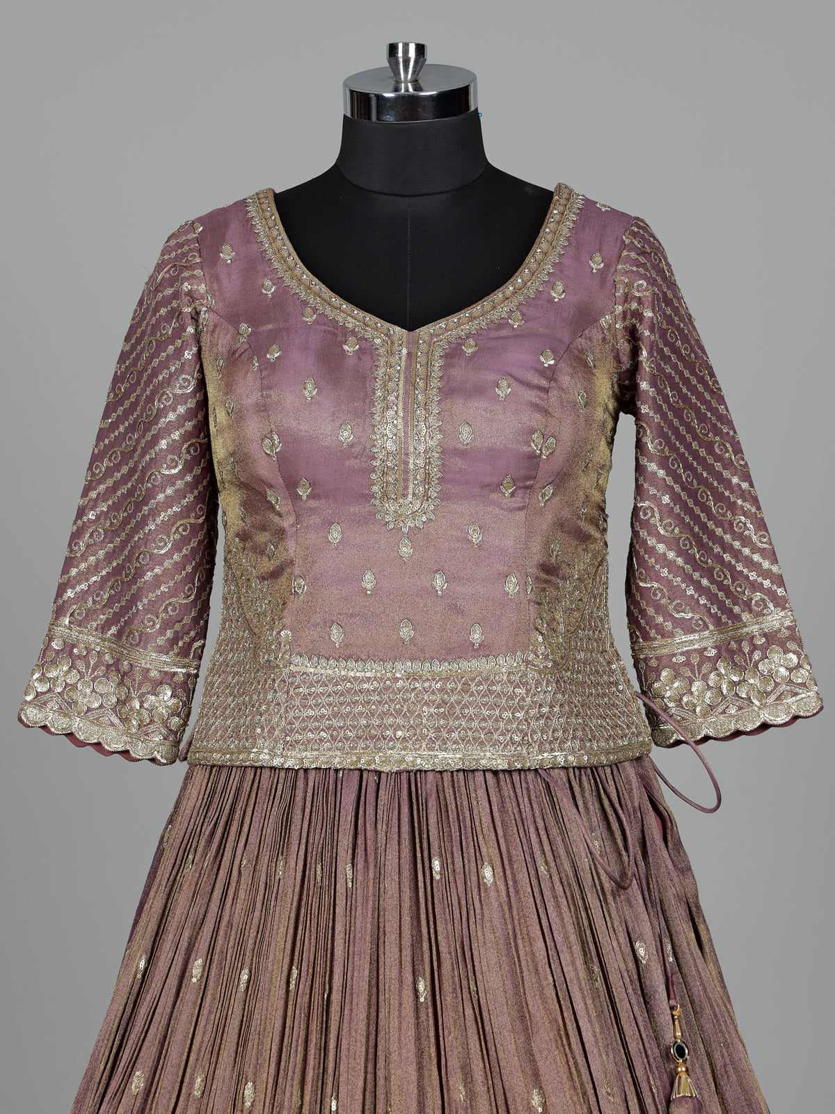 Pastel purple silk lehenga choli with intricate zardosi work