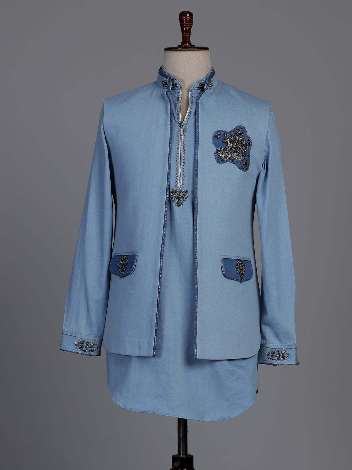 Sky blue waistcoat set with embellished brooch