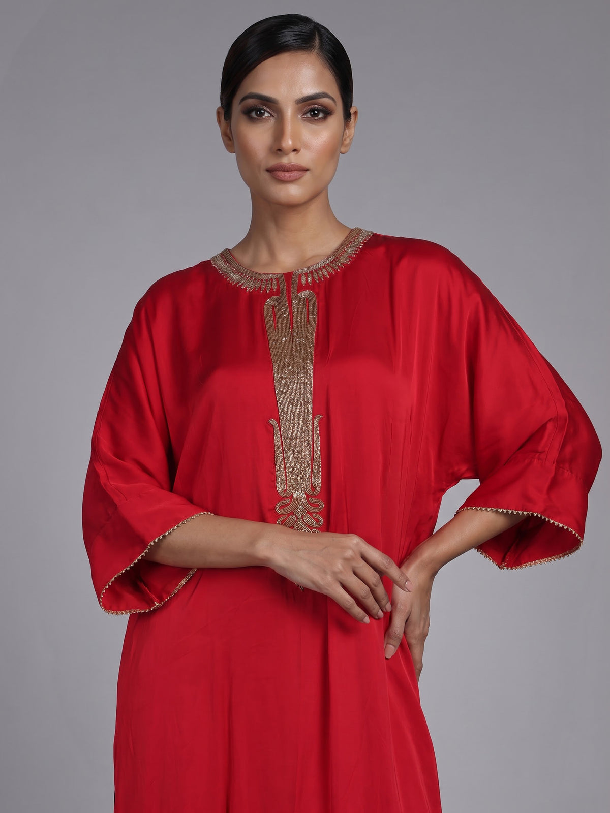 Vibrant red modal satin kurti set with cutdana detailing