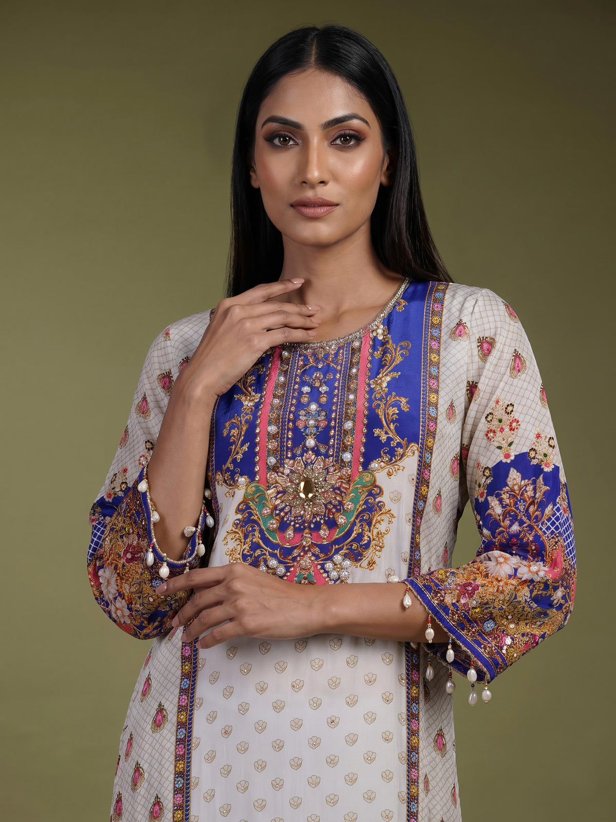 Elegant off-white pure crepe kurti set with zardosi embellishments