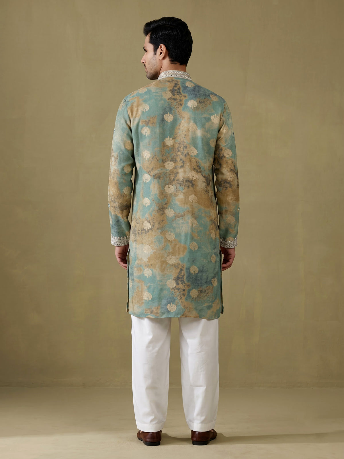 Sea green silk kurta suit with mirror work embroidered neckline