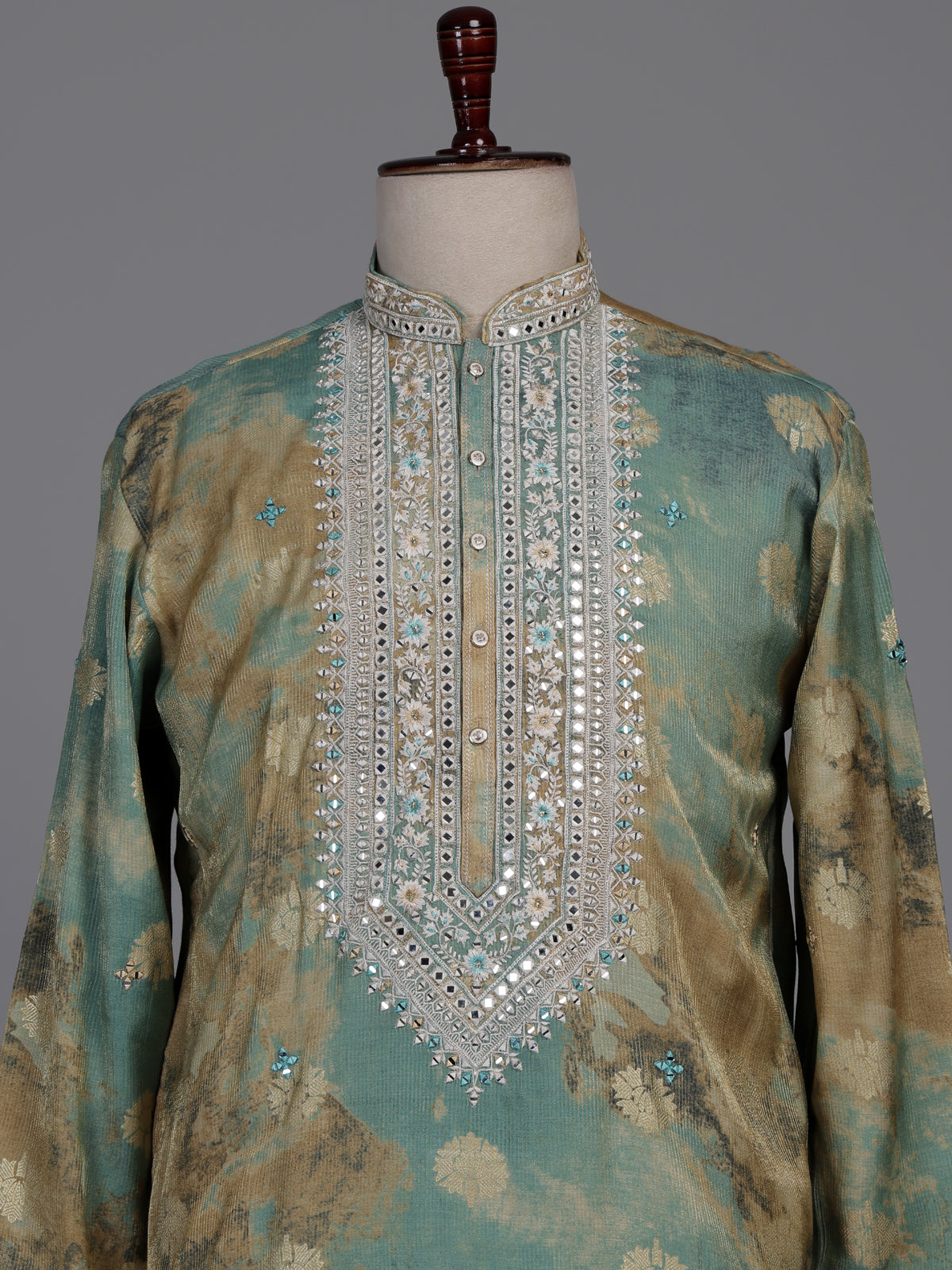 Sea green silk kurta suit with mirror work embroidered neckline