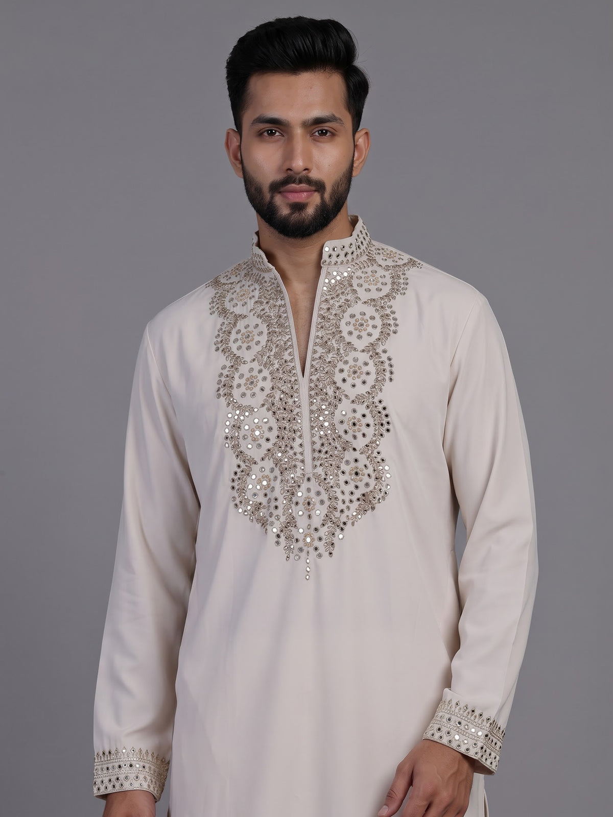 Off white short kurta suit with gold embroidered bib