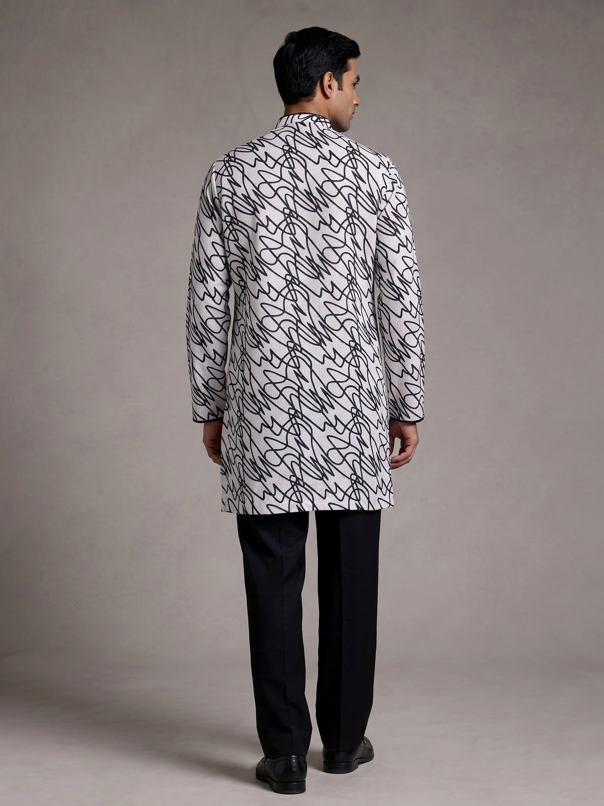 White linen kurta suit with black abstract doodle print