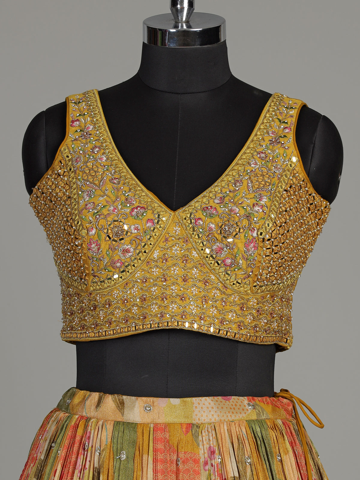 Mustard yellow floral silk lehenga choli with designer embellishments