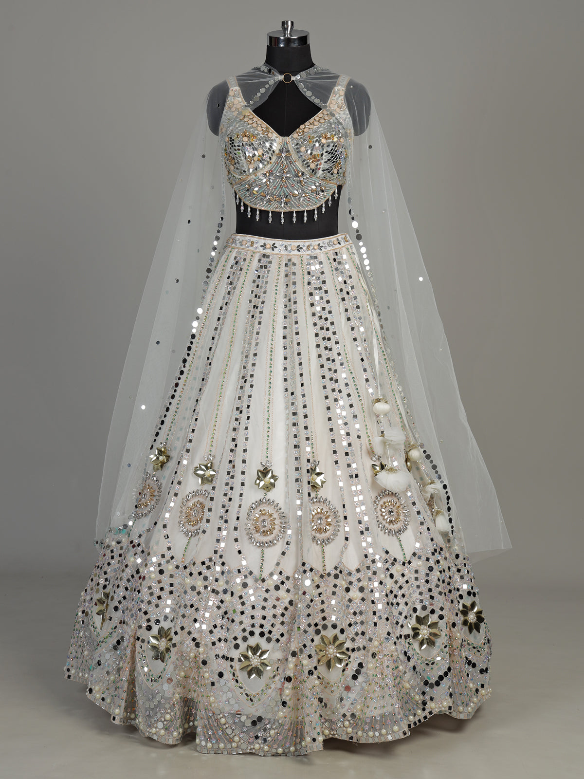 White net designer lehenga choli with sparkling diamond embellishments