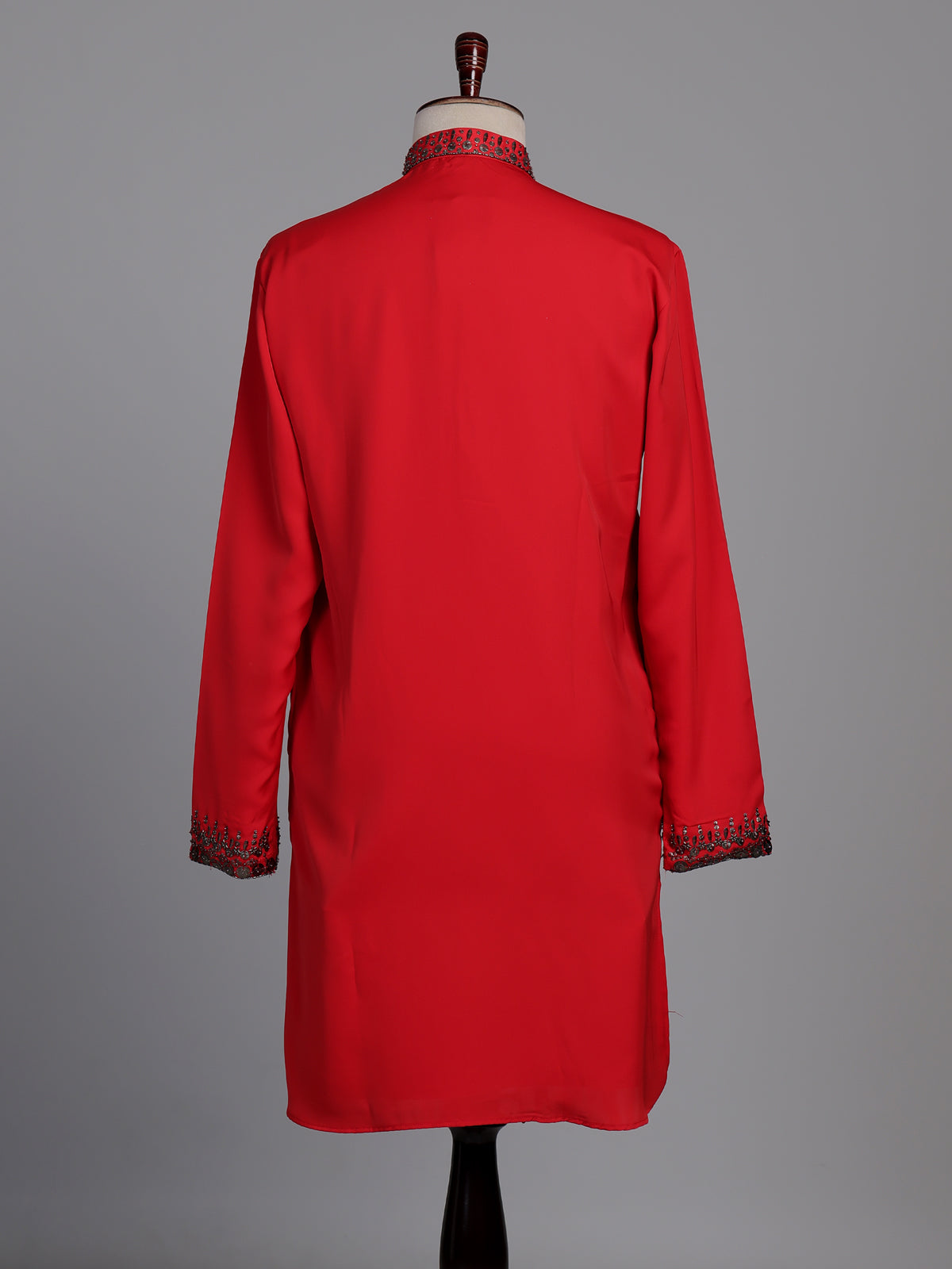 Scarlet red crepe silk kurta suit with antique silver embellished bib