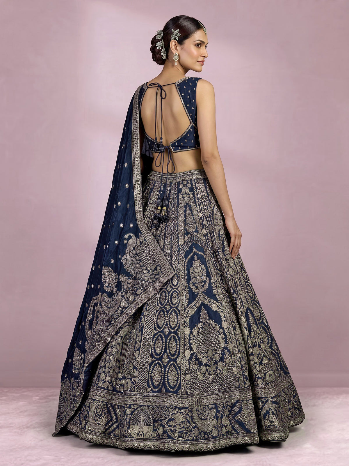 Teal blue silk lehenga choli with square neck zari embellishments