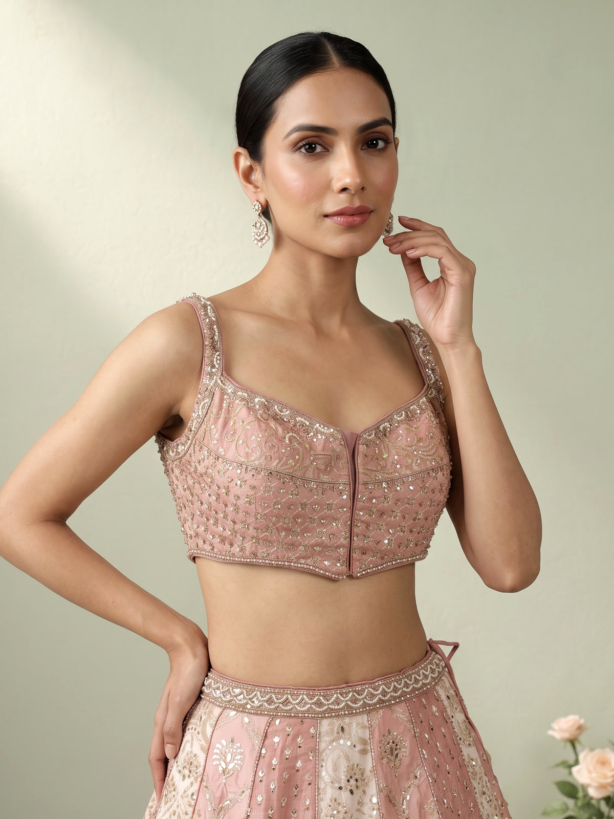 Peach silk lehenga choli with exquisite mirror zari embellishments