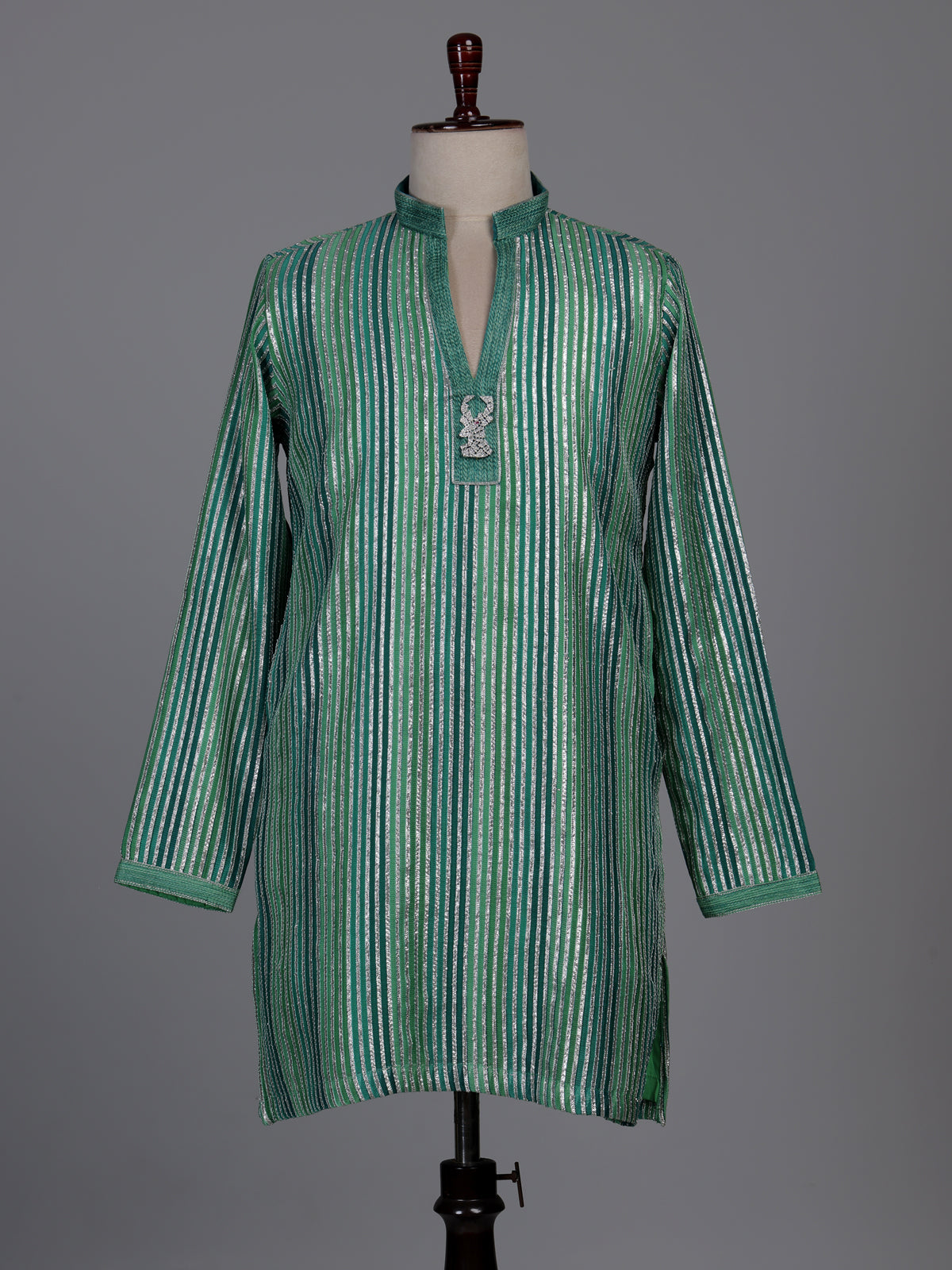 Emerald green kurta suit with shimmering silver gota patti stripes