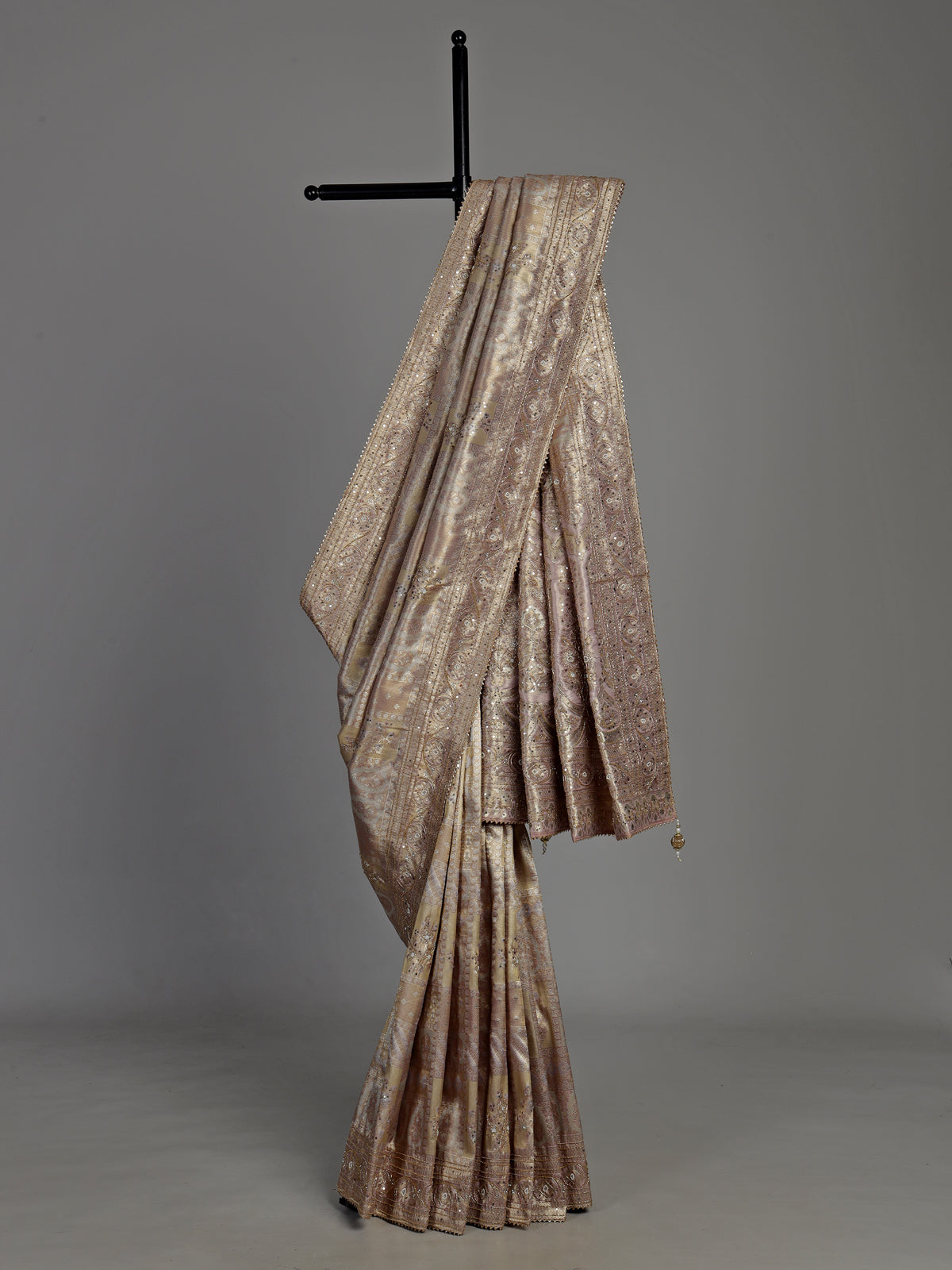 Lavender purple tissue silk saree with detailed zardosi and zari embellishments