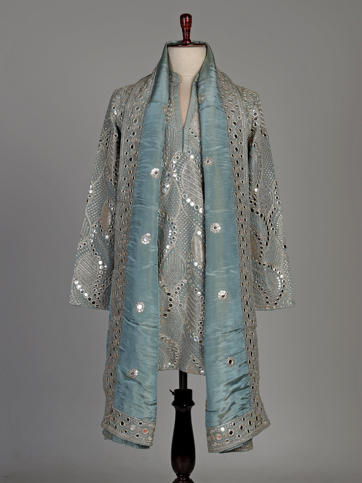 Pastel mint blue silk kurta set with embellished swirl embroidery