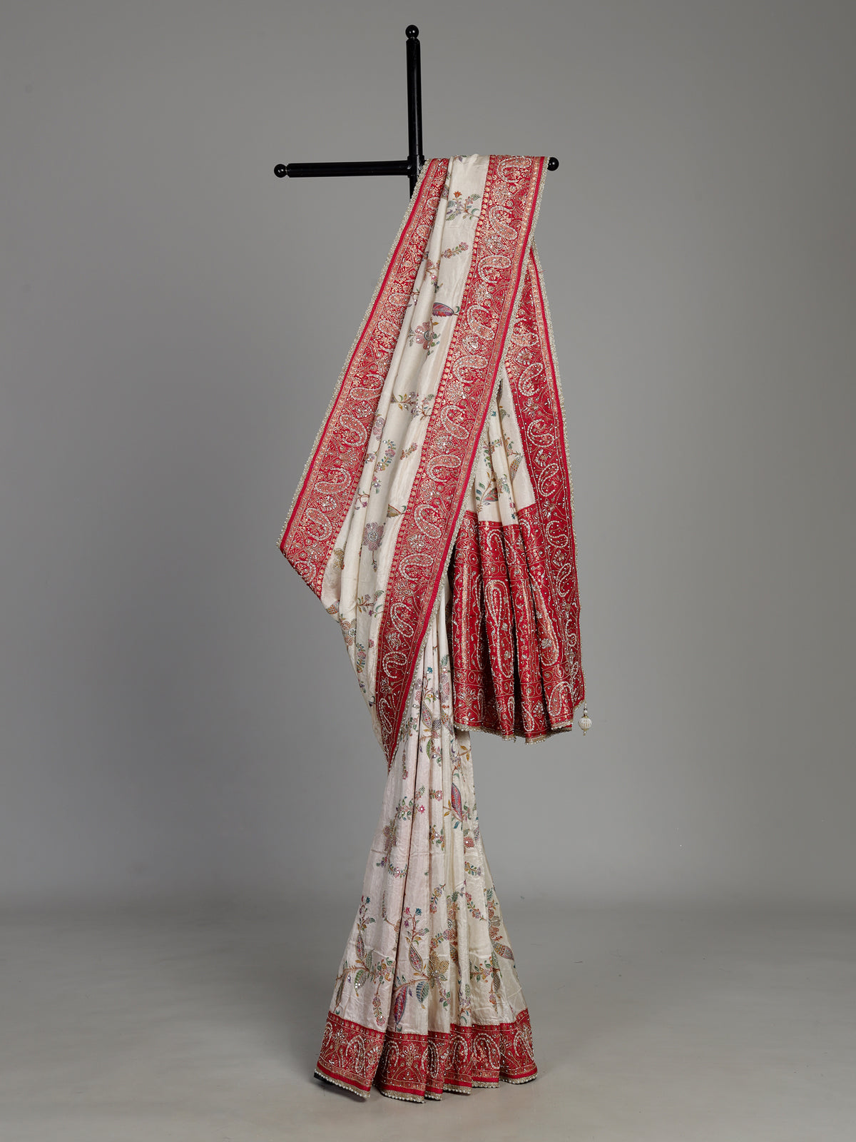 Cream pashmina saree with floral embroidery and diamond embellishments
