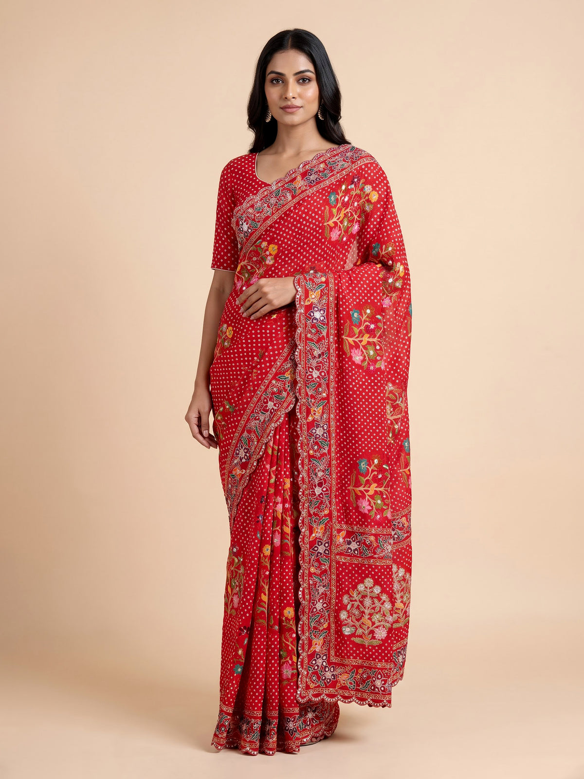 Red muslin silk saree with bandhani print and traditional aabla embellishments