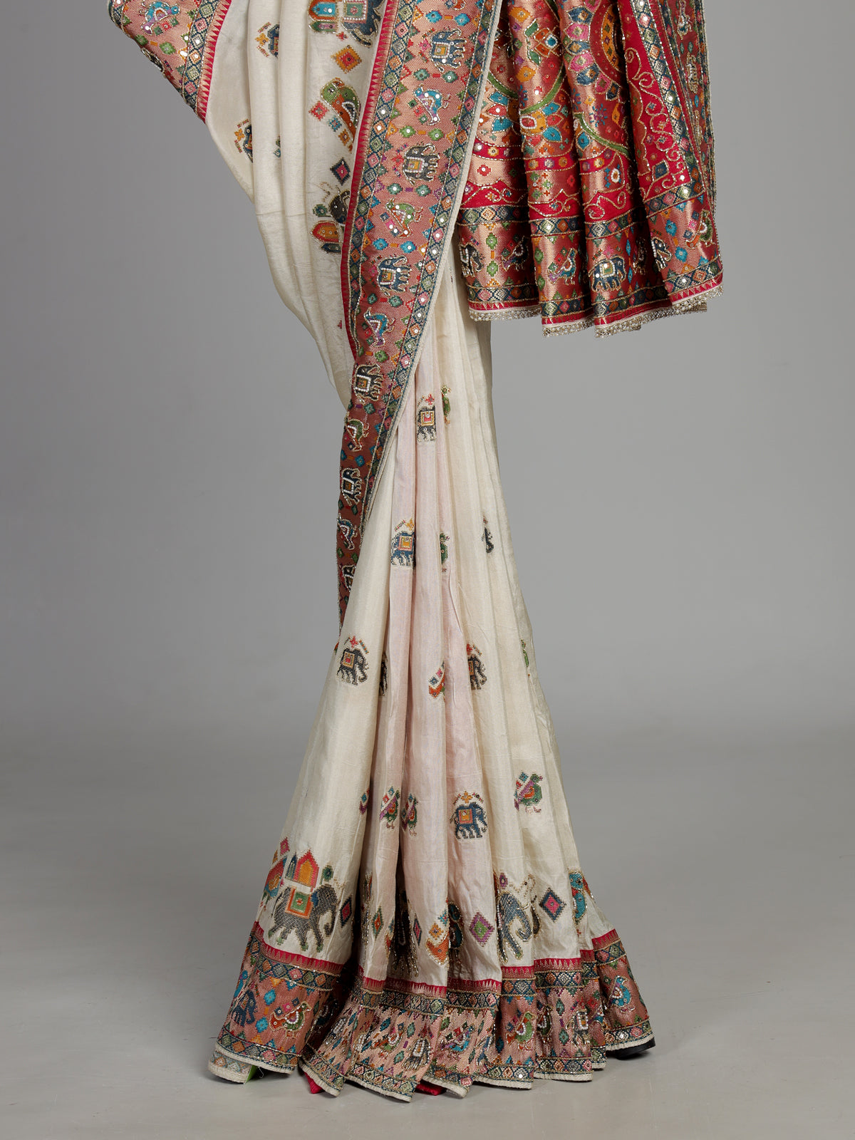 Cream pashmina saree with elephant and bird motifs and zari