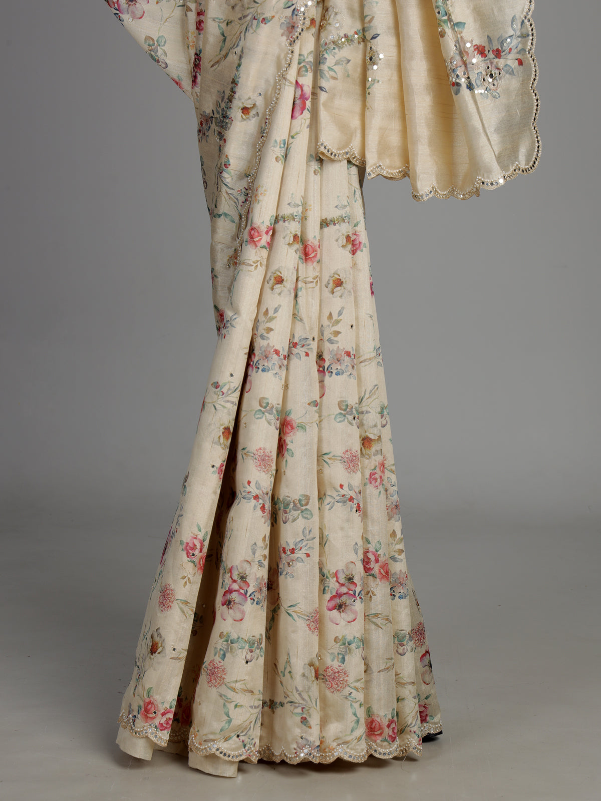 Cream tusser silk saree with floral prints and embellished beadwork