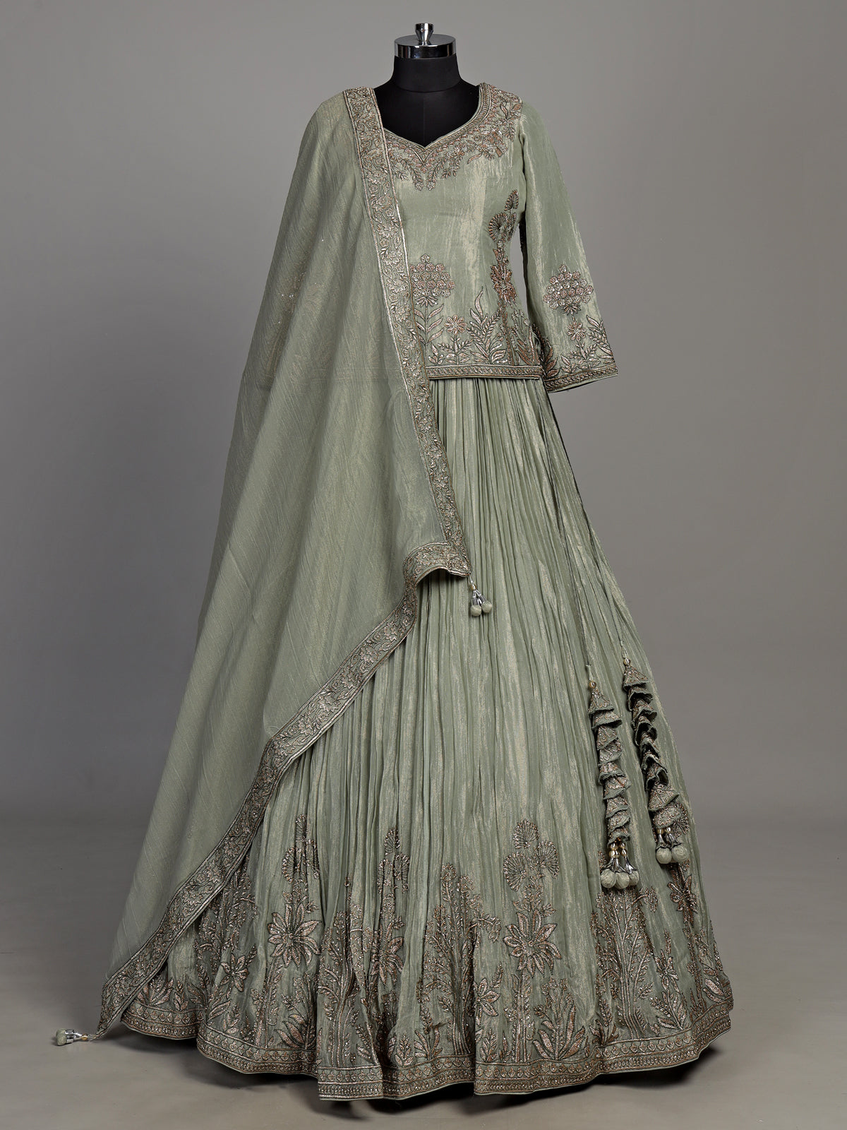 Sage green tissue silk lehenga choli with rajasthani style choli