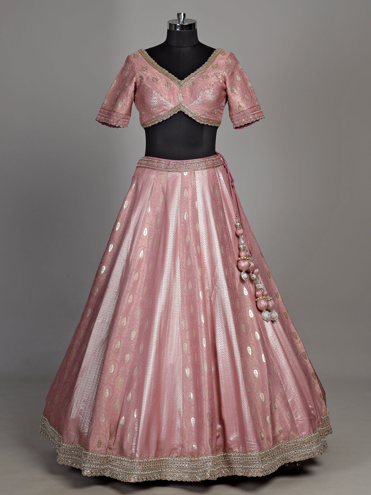 Pink banarasi silk lehenga choli with luxurious zari and pearl embellishments