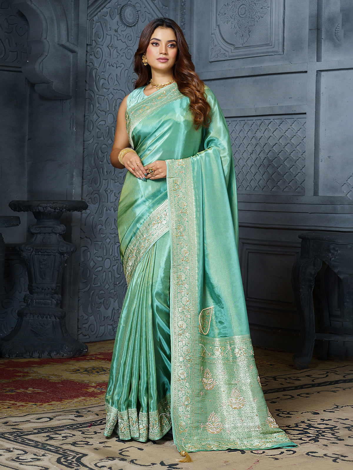 Luxury pastel green embroidered tissue saree for women