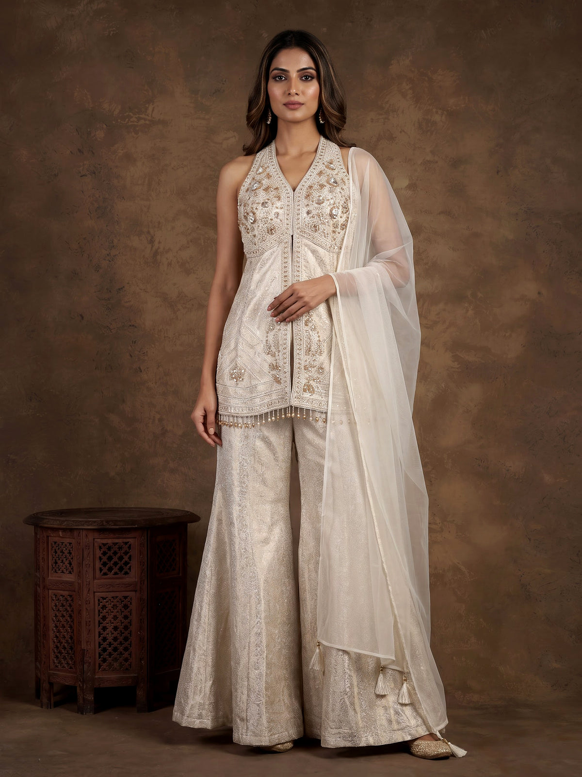 Cream brocade silk palazzo suit with rich cutdana detailing