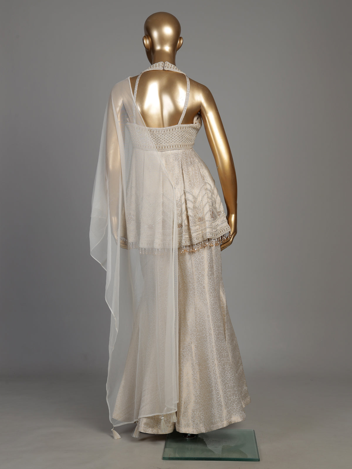 Cream brocade silk palazzo suit with rich cutdana detailing