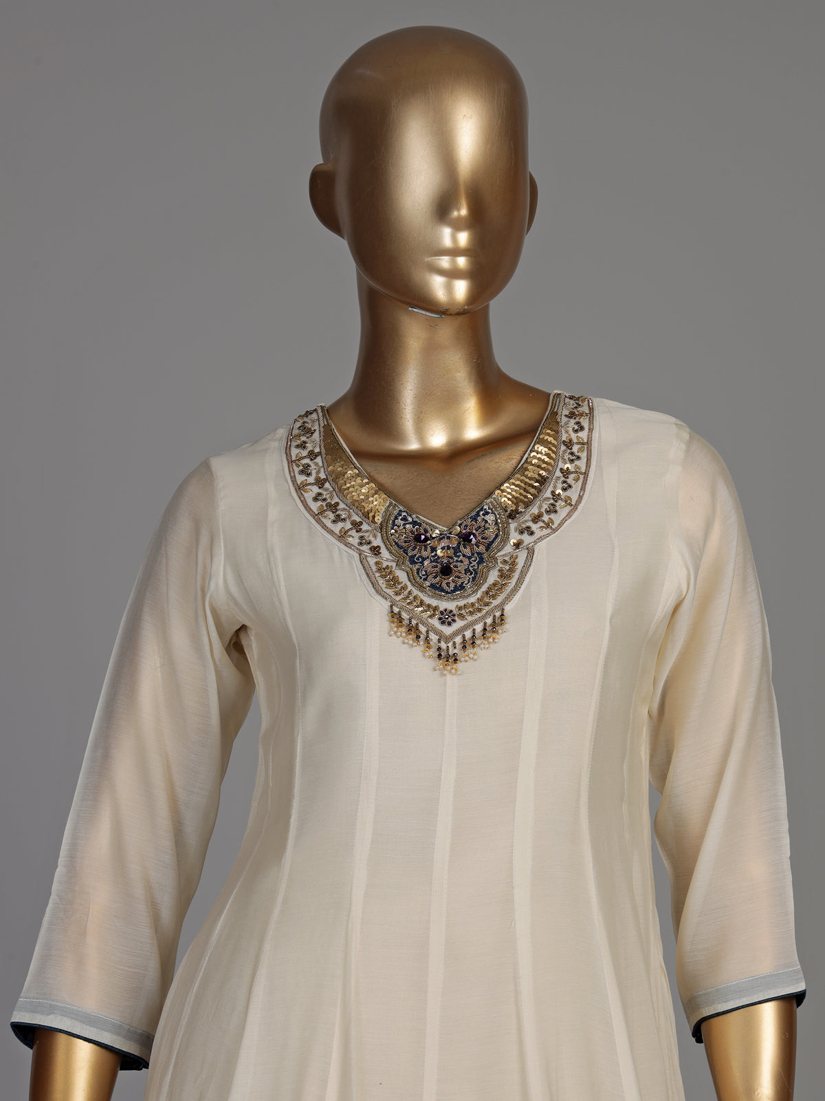 Cream viscose anarkali palazzo suit with intricate zardosi work