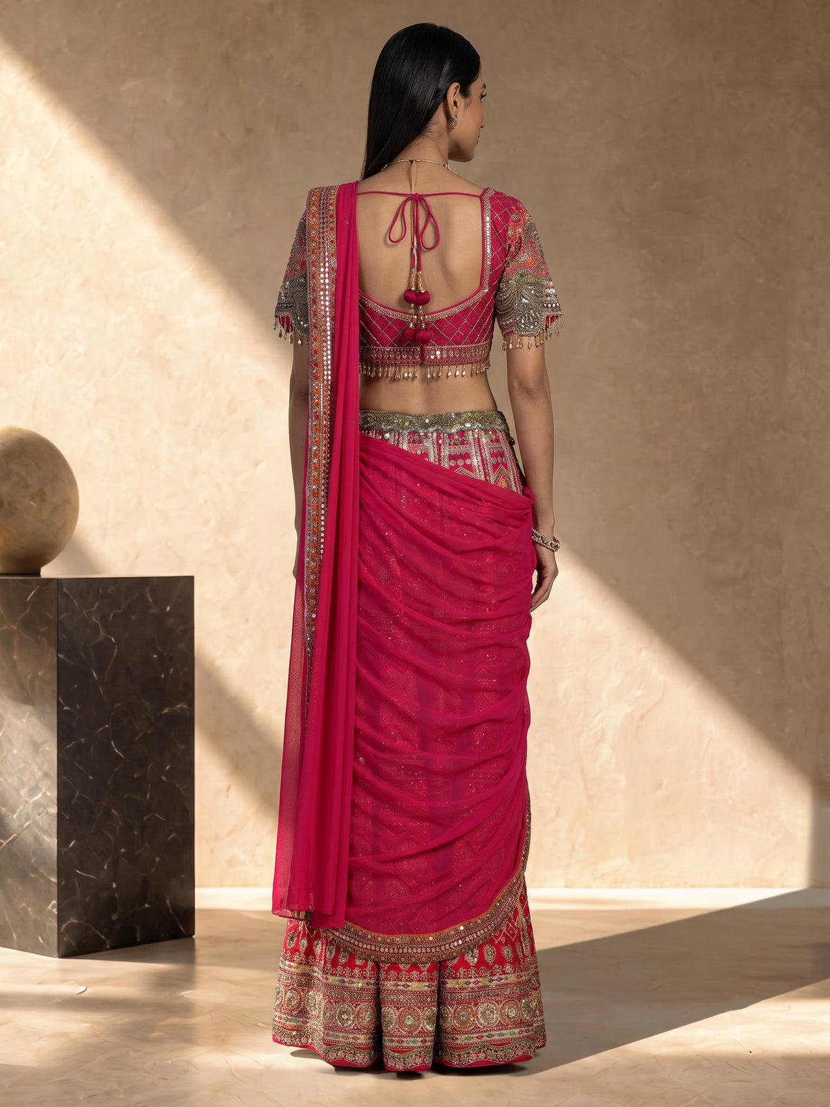 Rani pink silk palazzo suit with an embellished georgette dupatta