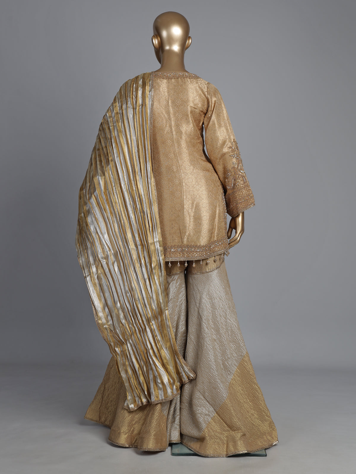 Gold brocade silk sharara suit with zardosi and zari work