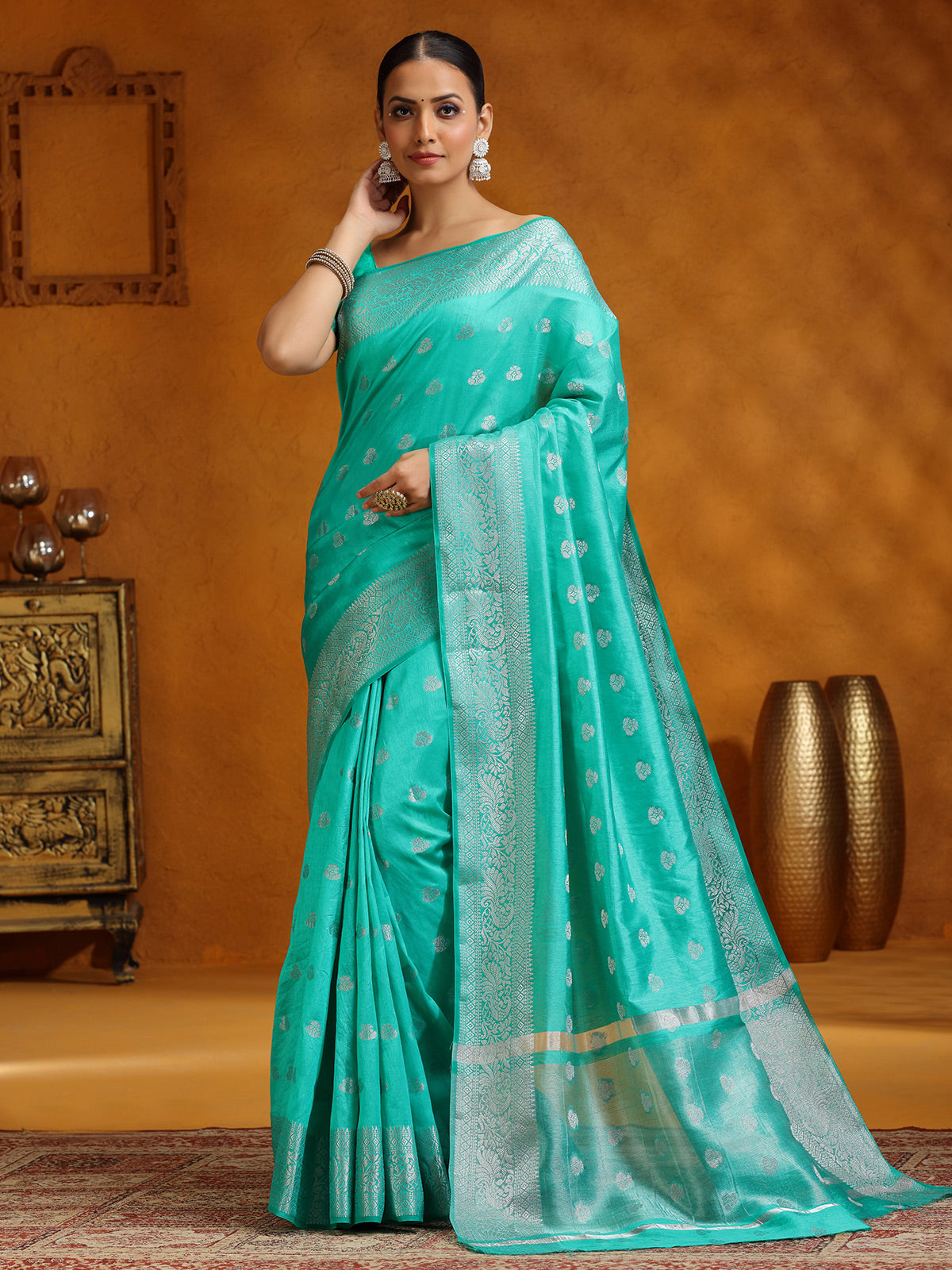 Aqua silk saree with silver weaving