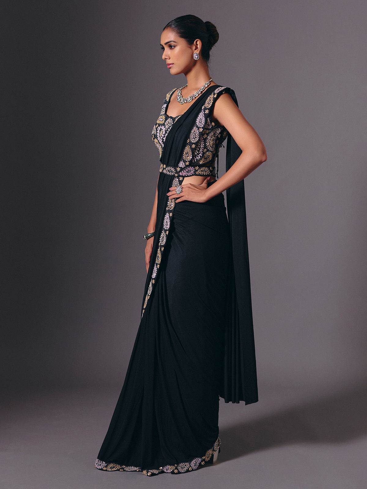 Black cruss lycra saree with sparkling bead embellishments