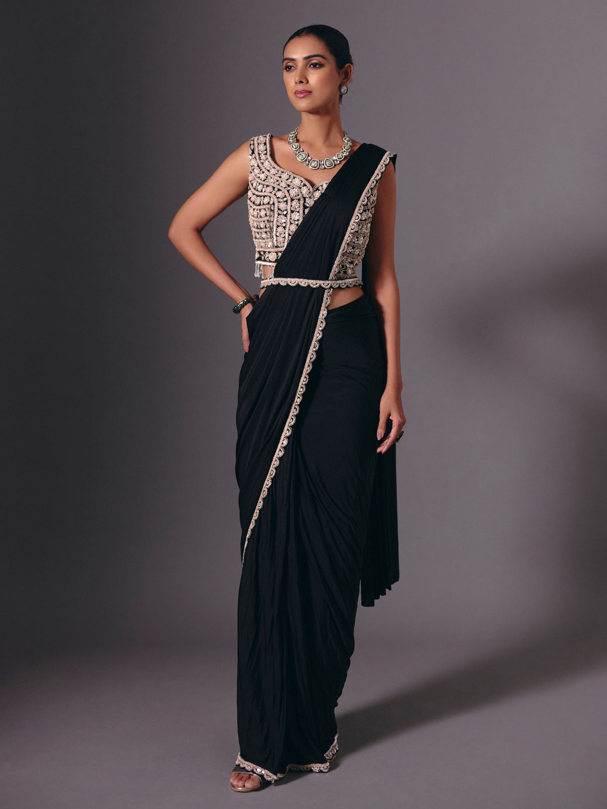 Black lycra saree with sequins and cutdana embellishments
