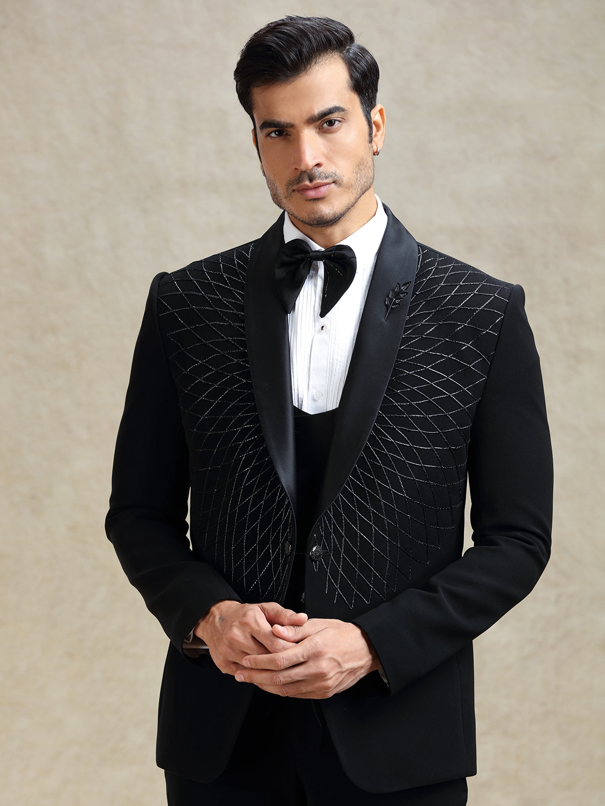 Black reception wear tuxedo suit in cutdana work