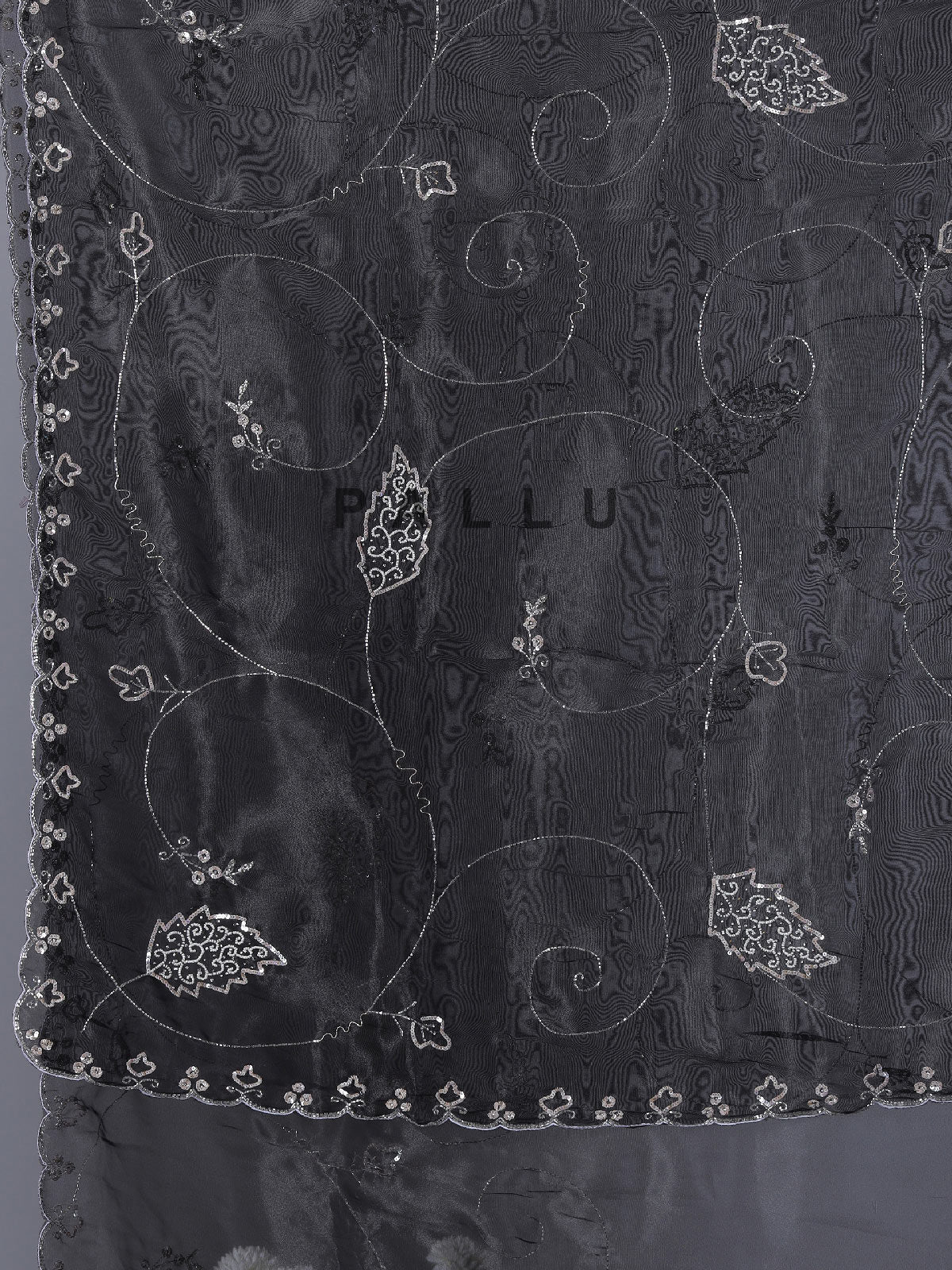 Black tissue silk saree with sequins and bead work
