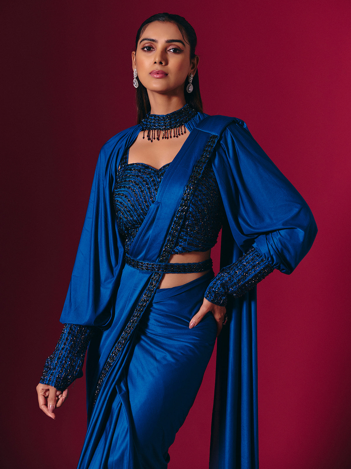 Blue lycra saree adorned with cutdana and pearls work