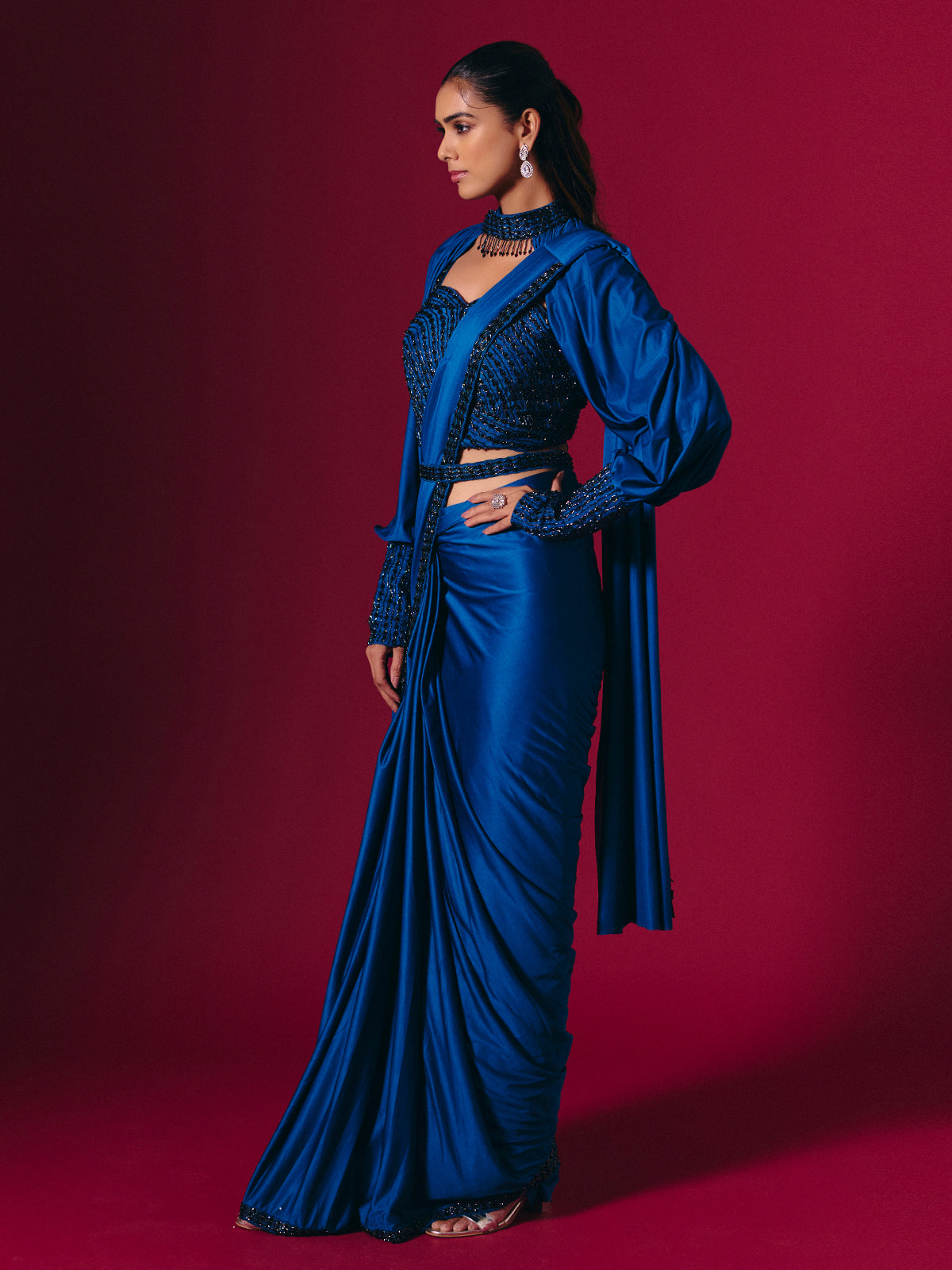 Blue lycra saree adorned with cutdana and pearls work