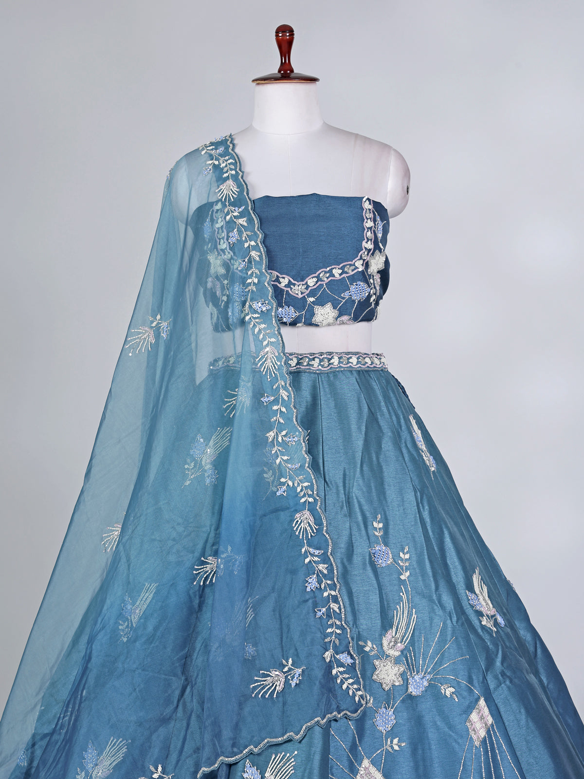Blue silk lehenga choli with zardosi and beads work