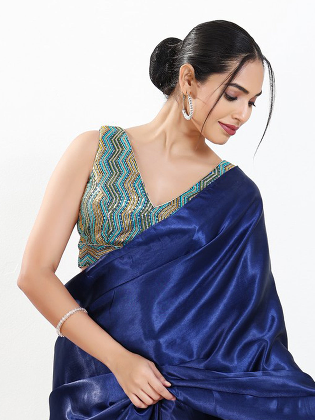 Blue silk V neck sleeveless ready made blouse