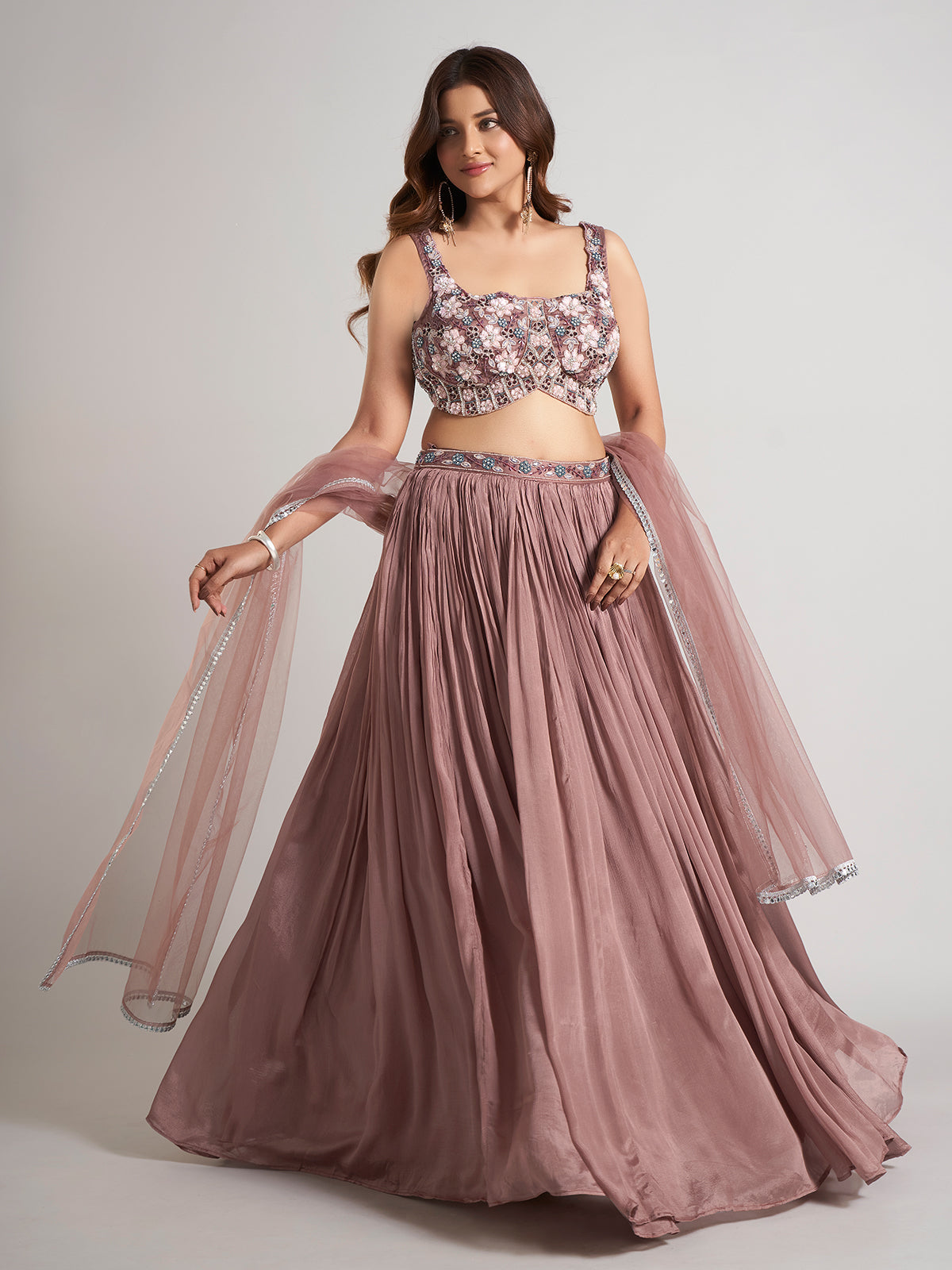 Brown silk lehenga choli with stone embellishments